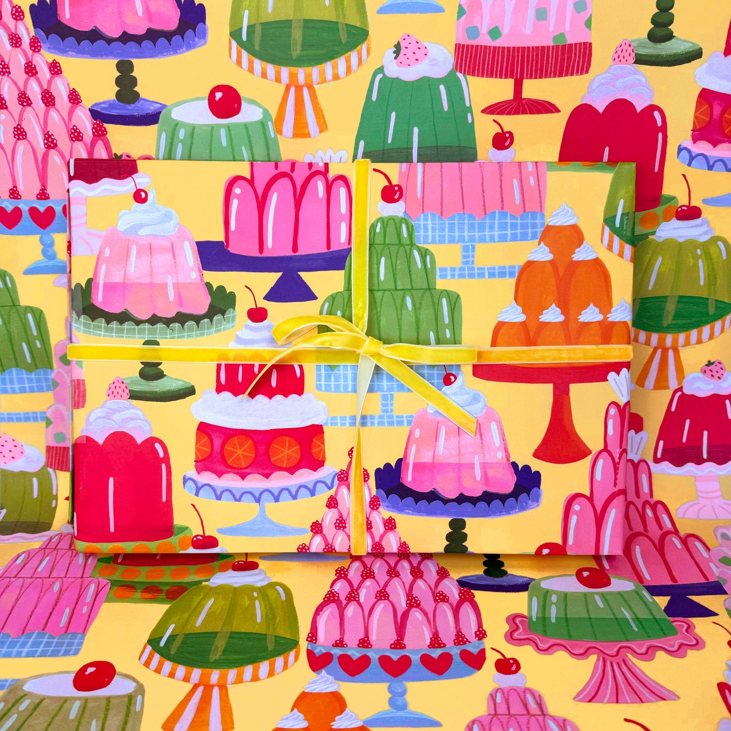 Colorful pattern of various desserts on a yellow background
