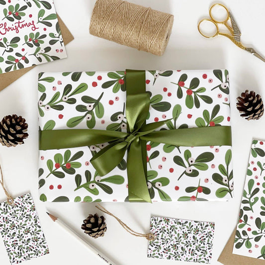 White mistletoe gift wrap suitable for Christmas or winter birthdays.