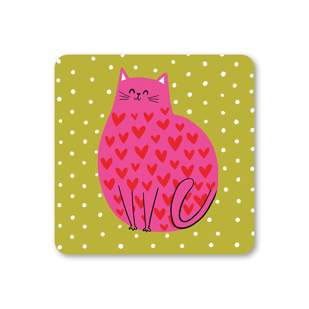 Coaster with a pink cat design on a green background with white polka dots
