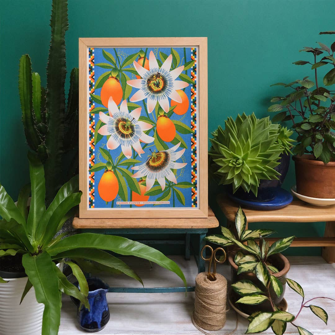 Colourful risograph print of a fruiting passionflower.