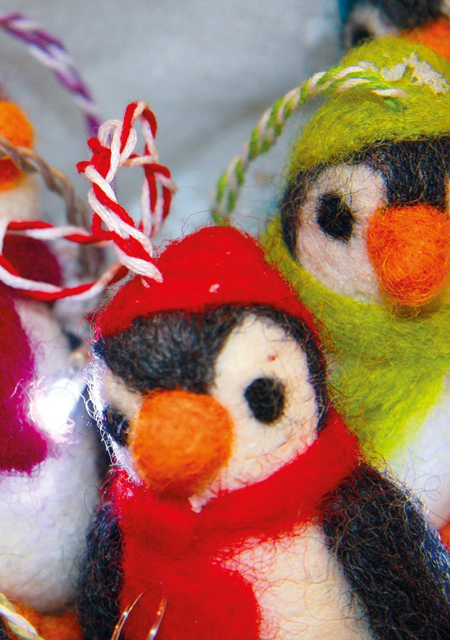 Set of 5 Felted penguins with hats and scarves.