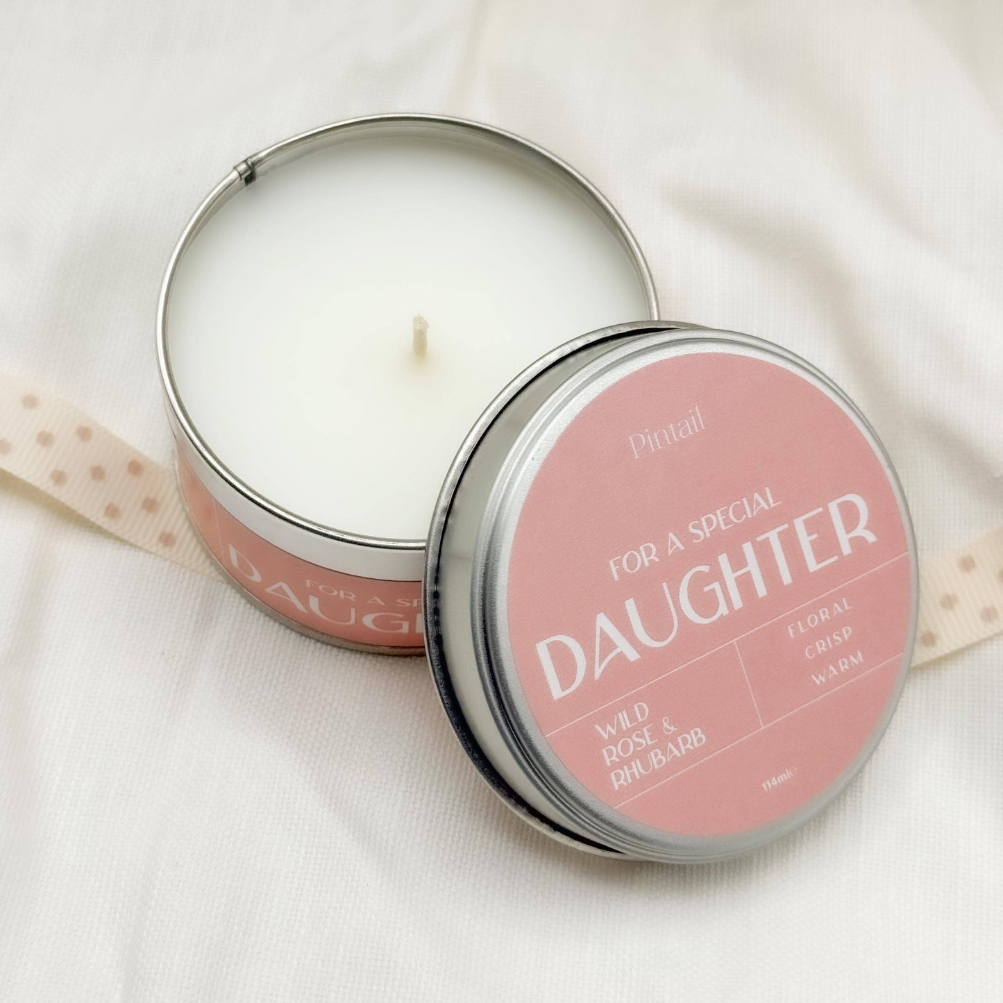 Candle in a tin with 'For a Special Daughter' text on a white background