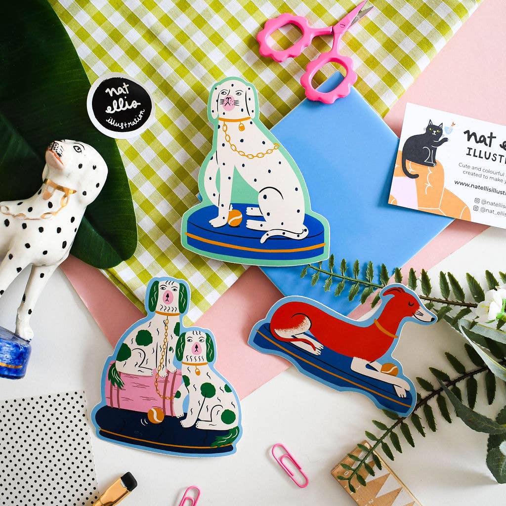 Decorative dog-themed paper clips on a colorful background with 'nat ellie' branding.