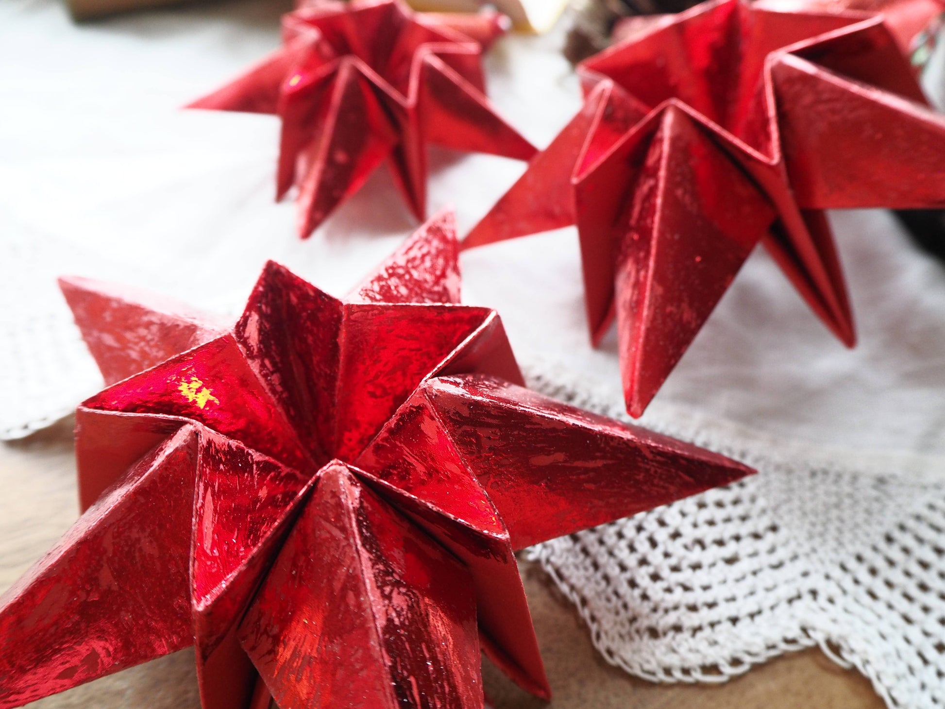 Origami Red metalic star decoration.