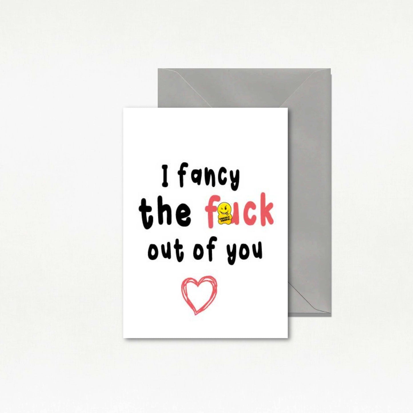 Card with text 'I fancy the fuck out of you' and a heart symbol on a white background with a gray envelope.