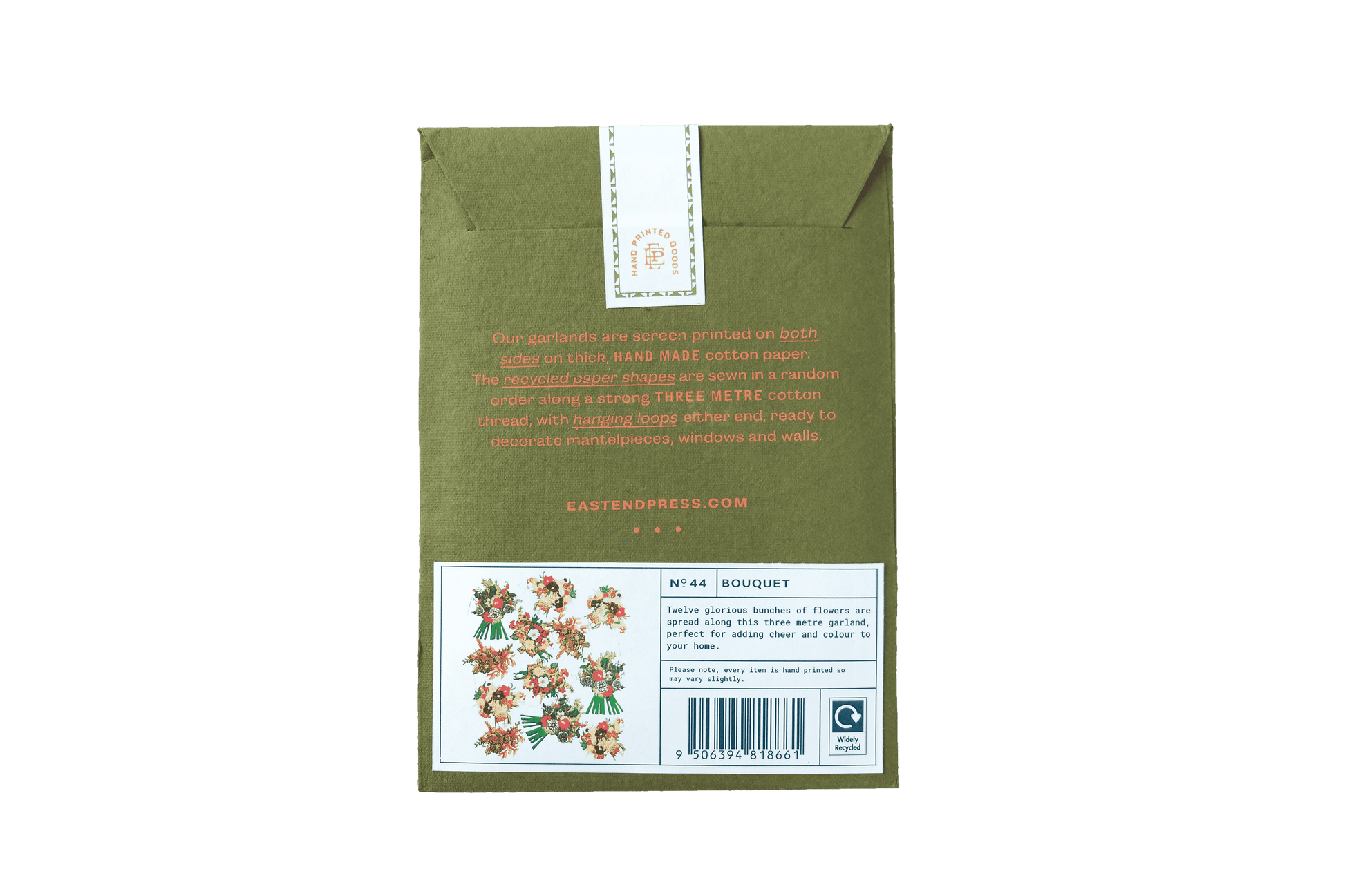 Back of a green envelope with text and a floral design on a green background