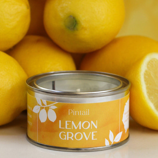 Lemon and poured candle in a small paint pot tin,