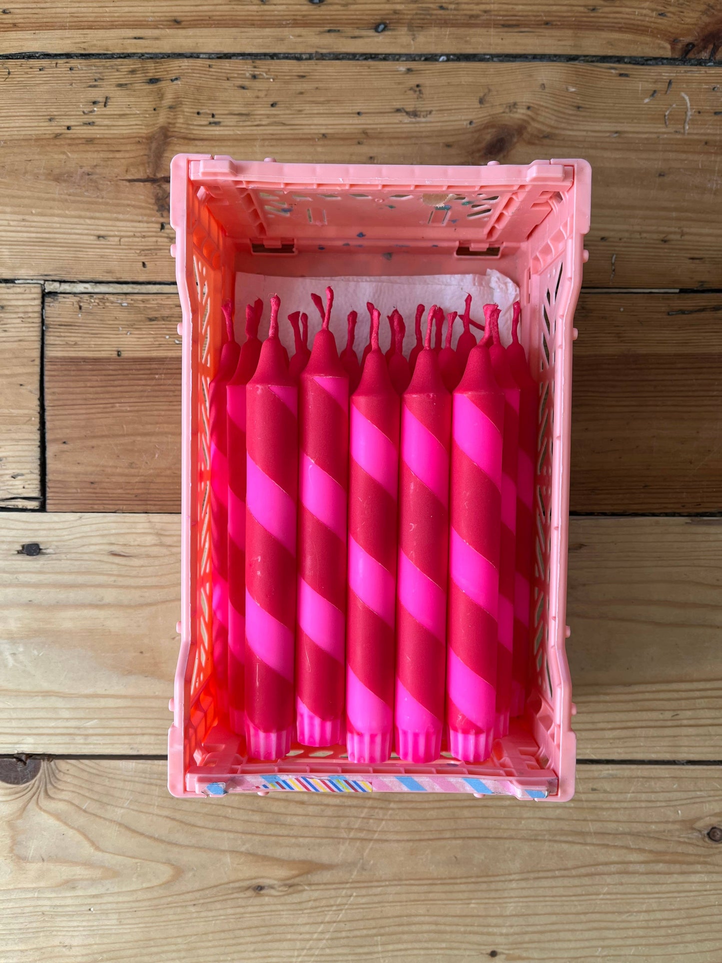 Helter Skelter red and neon pink table candle.