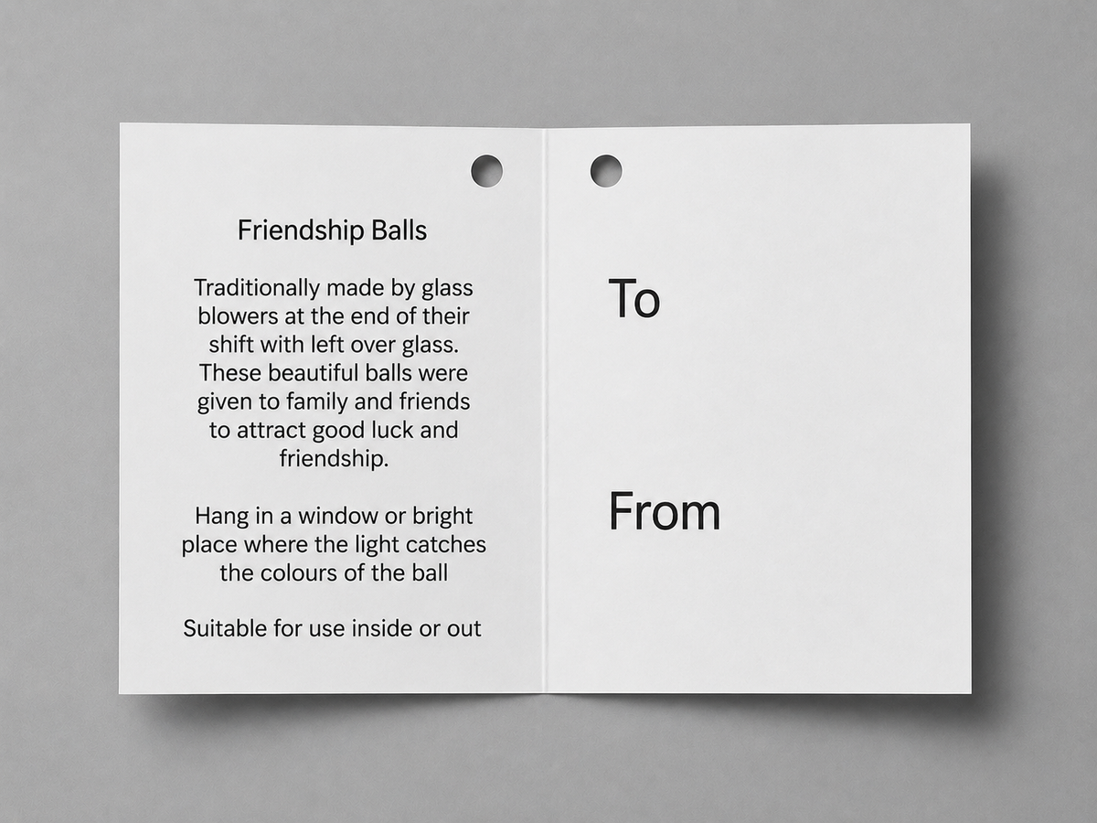 Card with text about friendship balls on a gray background