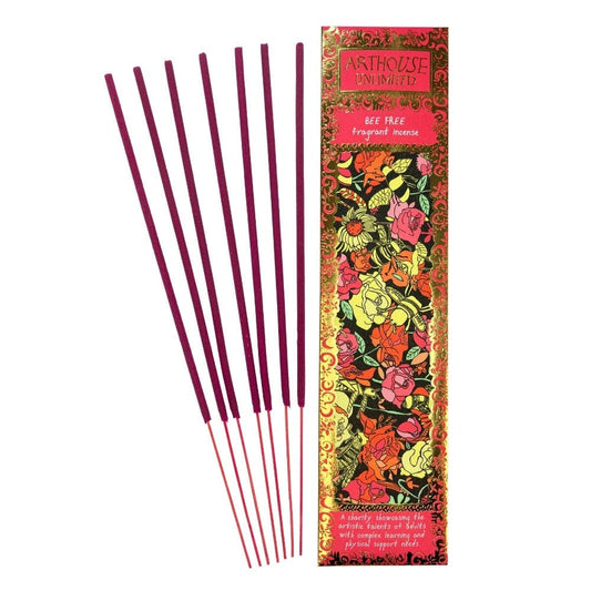 Five incense sticks with deep purple-red tips and light pink bodies are displayed next to their decorative packaging box by Antrouse Incense. The box features a vibrant, multicolored floral pattern with gold accents and reads 'ANTROUSE INCENSE' and 'BEE TREE Fragrant Incense'.