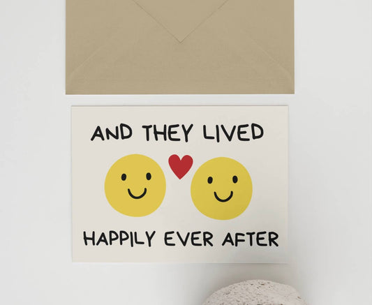 Decorative sign with smiley faces and text on a wall