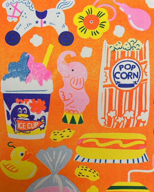 Colorful fabric with illustrations of ice cream, popcorn, and other snacks on an orange background.