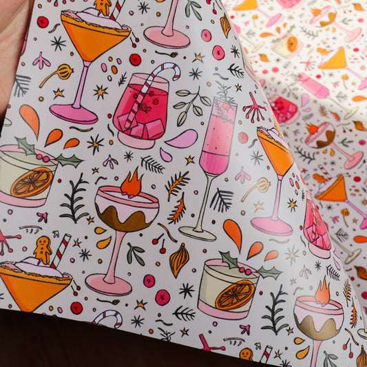 Patterned fabric with colorful cocktails and desserts on a white background