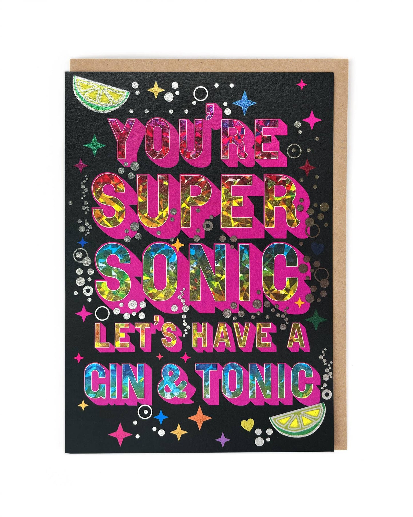 A card with the phrase "You're supersonic let's have a gin & tonic" in a sparkly font surrounded by bubbles, limes and sparkles.