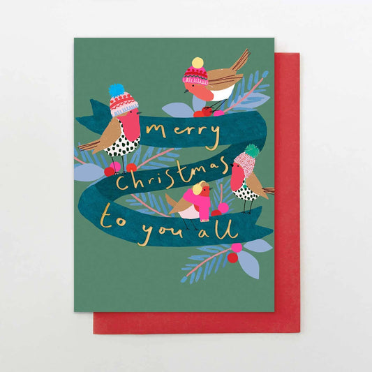 Christmas card with illustrated birds and 'Merry Christmas to you all' text on a green background.