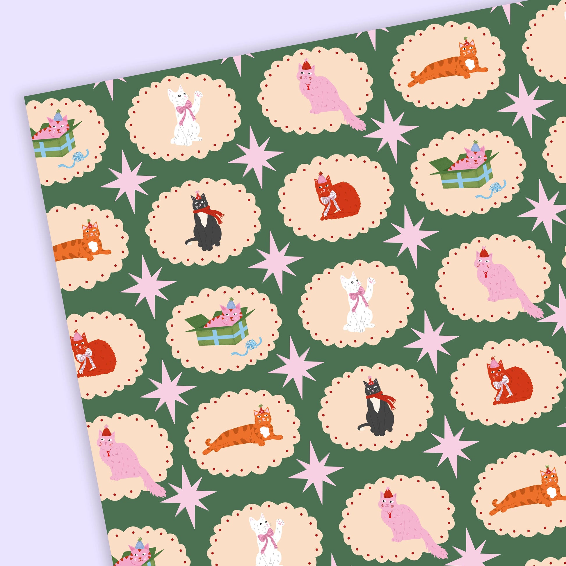 Vintage Style Christmas Wrapping paper with an assortment of cats in Christmas Hearts - Green background.