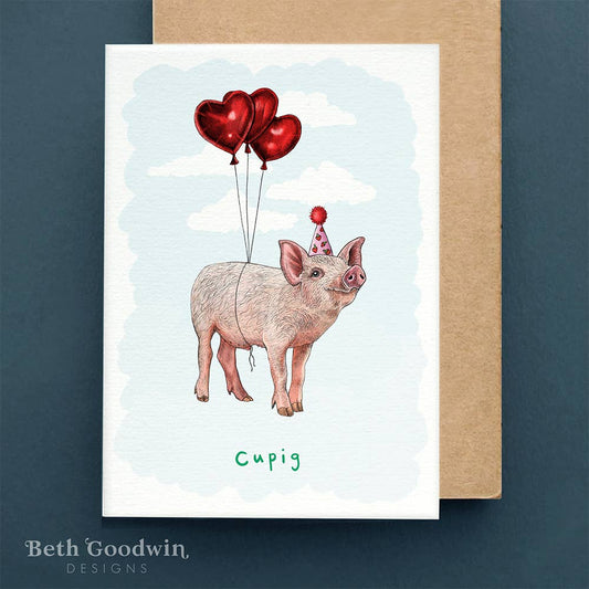 Card with a pig illustration holding heart-shaped balloons, featuring the brand 'Beth Goodwin Designs'.