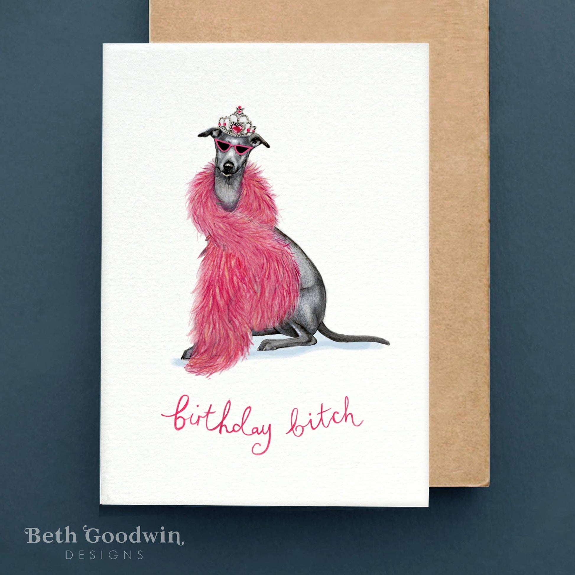 Greeting card with a dog wearing a pink fur coat and crown, text 'Birthday bitch', and 'Beth Goodwin Designs' on a white background.
