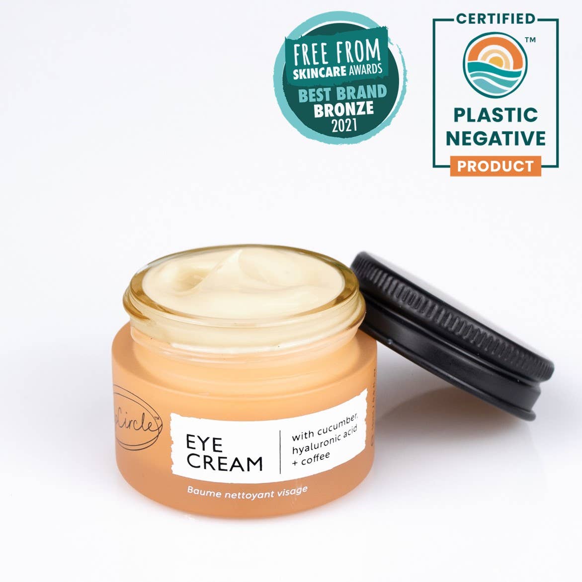 Vegan eye cream in glass jar. Containing cucumber, hyaluronic acid and coffee