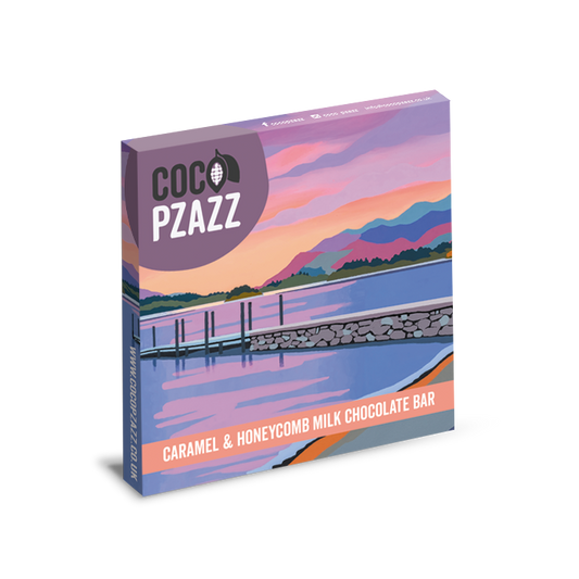 Coco Pzazz chocolate bar packaging with a scenic design on a white background
