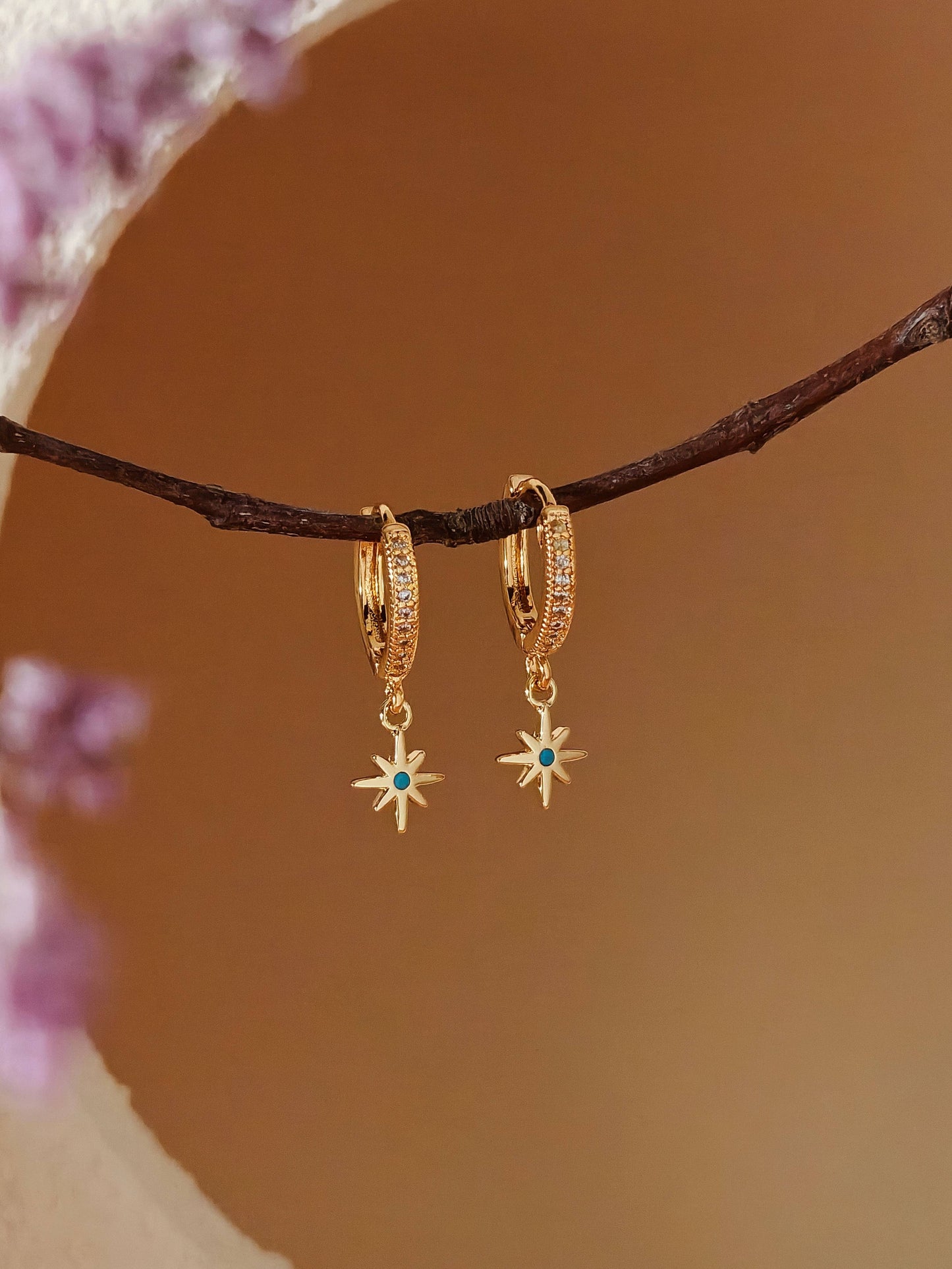 Tiny North Starburst Skye Blue CZ Huggie Hoop Earrings