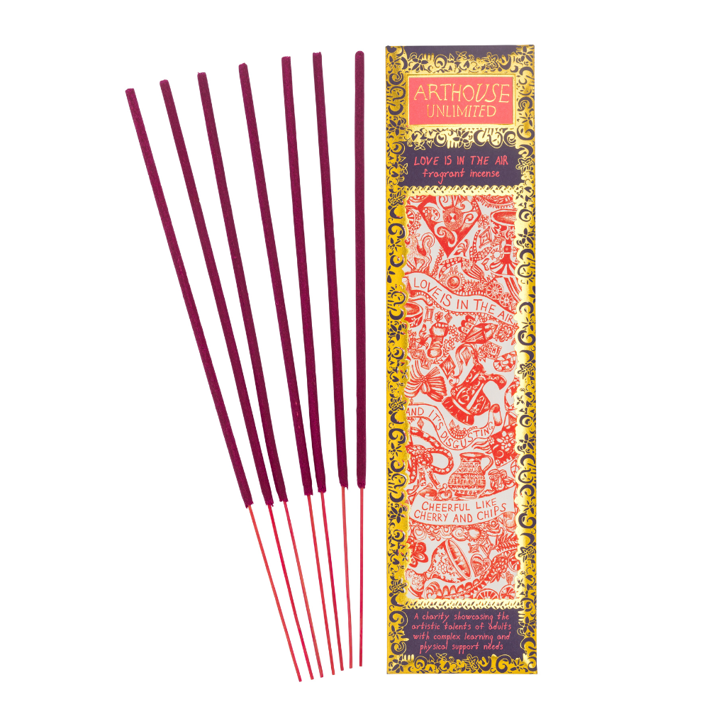 Incense sticks with a colorful box packaging on a white background