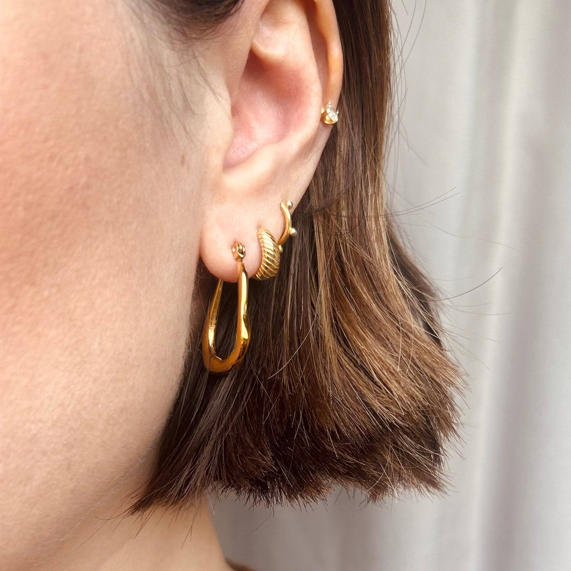 Gold plated abstract hoops