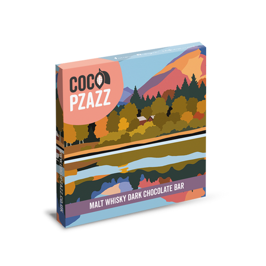 Coco Pzazz malt whisky dark chocolate bar packaging with a scenic design on a white background