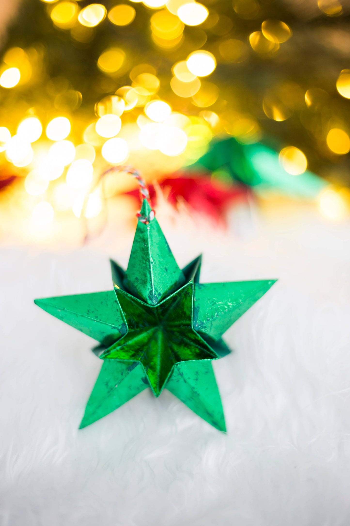 Origami Metallic Paper Star Decoration in red or green.