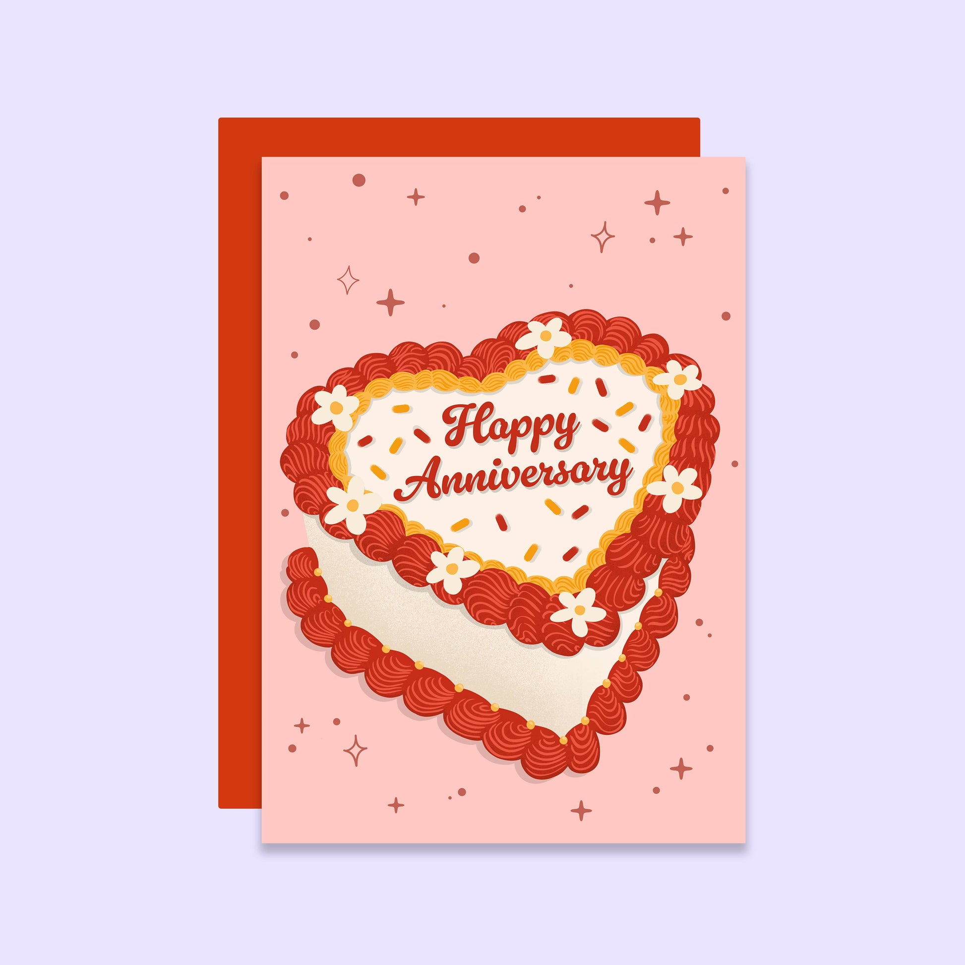 Greeting card with heart-shaped cake design and 'Happy Anniversary' text on a pink background