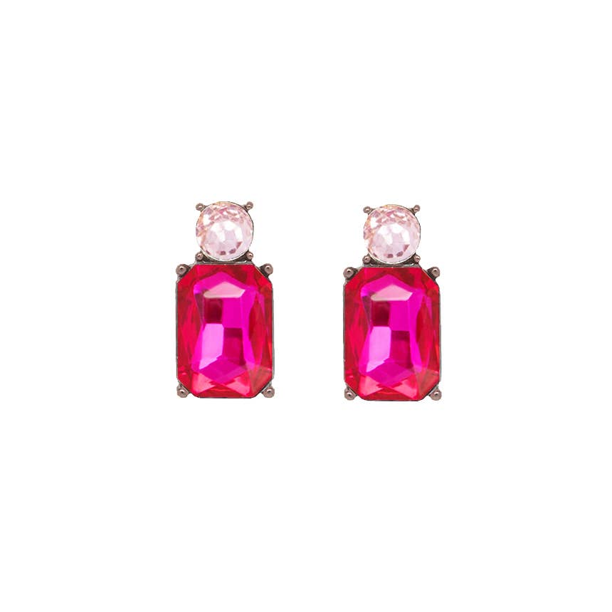 Pair of earrings with pink gemstones on a white background