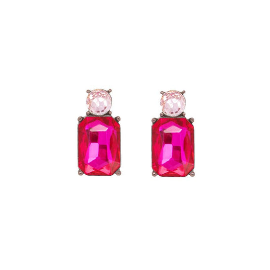 Pair of earrings with pink gemstones on a white background