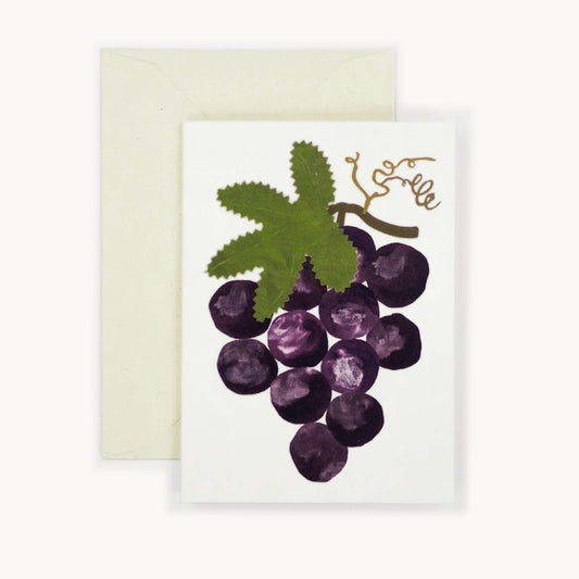 small greetings card with illustration of grapes on white background