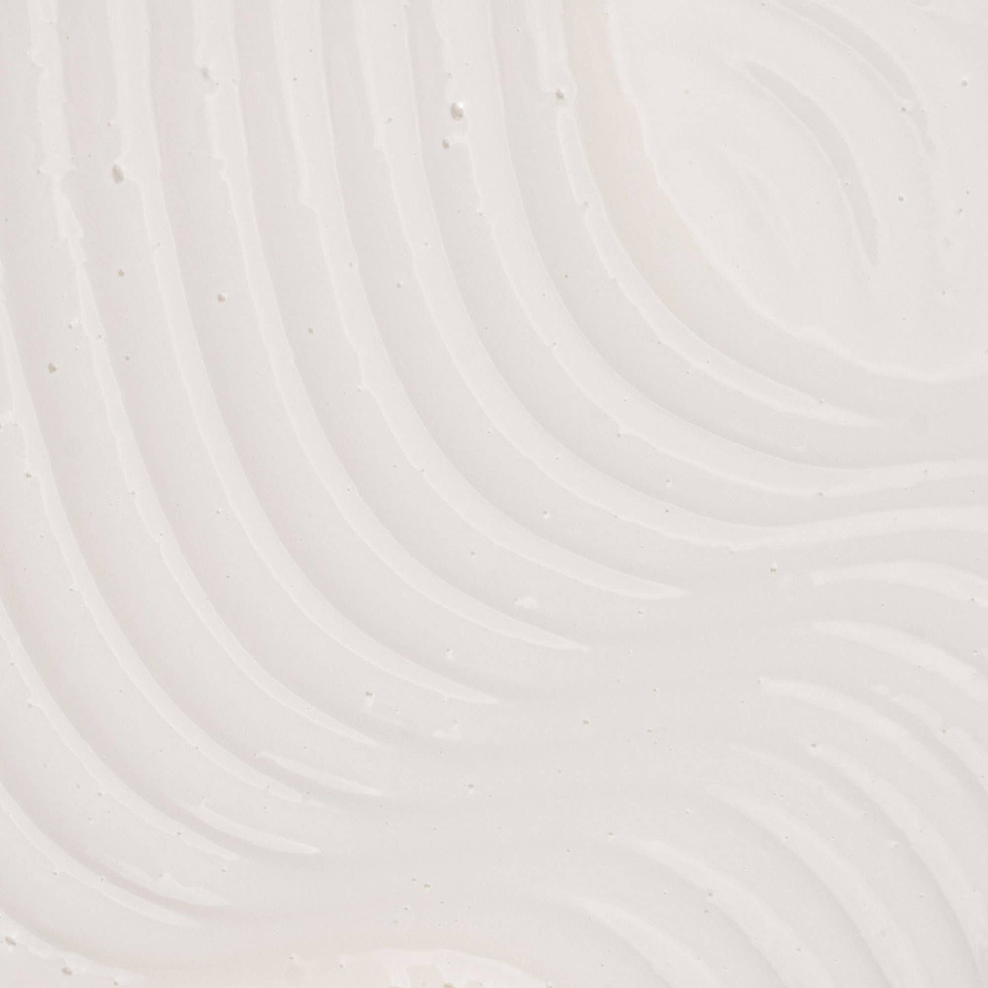 Close-up of a textured white surface with circular patterns