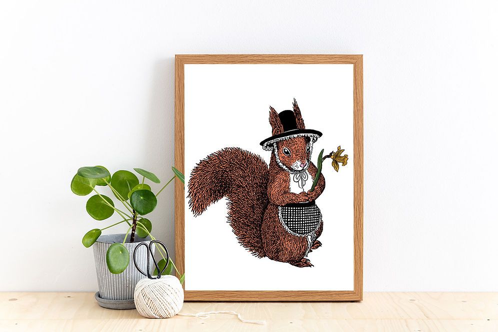 A framed art print featuring a red squirrel wearing a black hat and checkered apron, holding a daffodil.