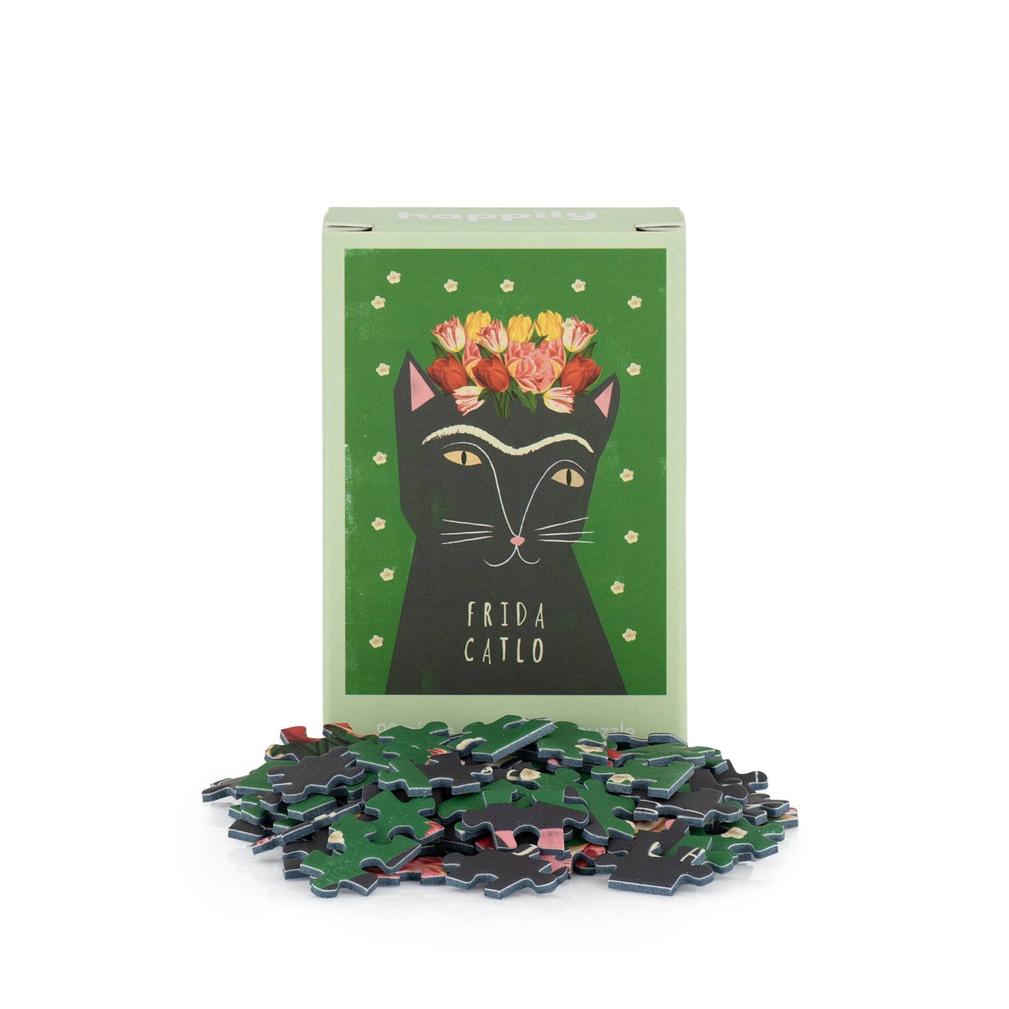 Frida Catlo puzzle with packaging featuring a black cat illustration and flowers on a green background.