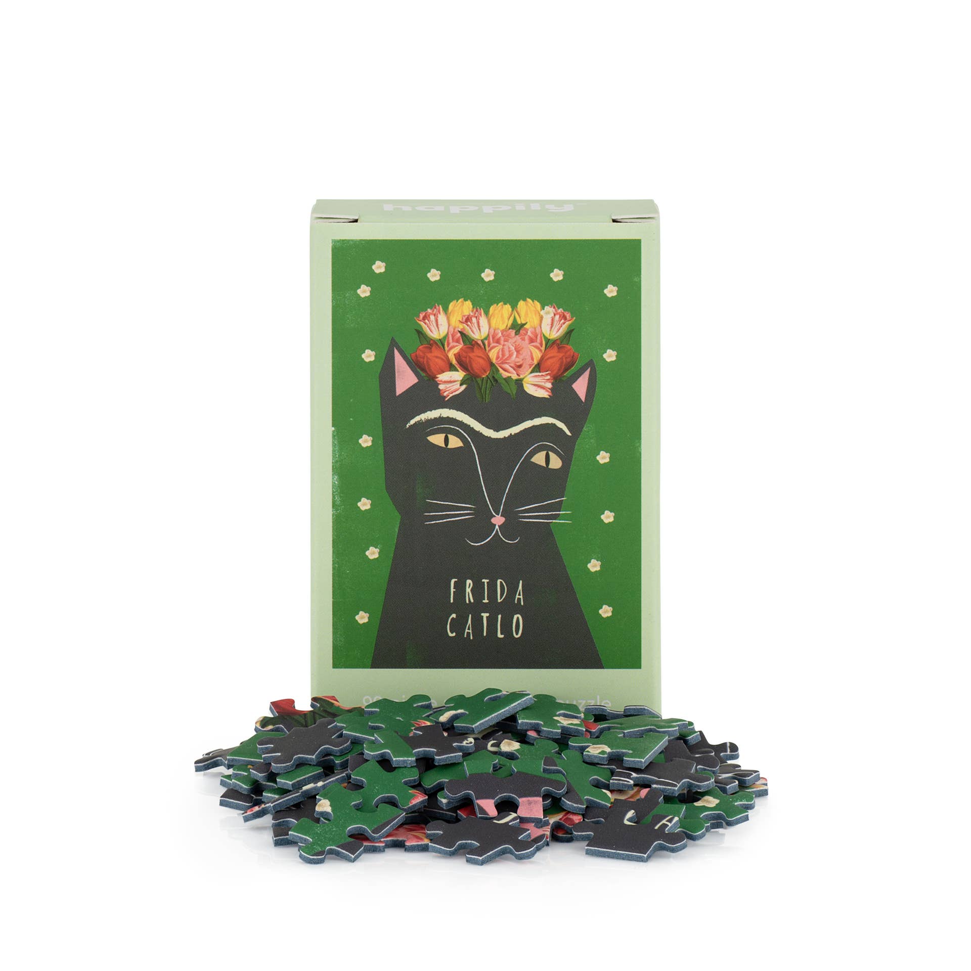 Frida Catlo puzzle with packaging featuring a black cat illustration and flowers on a green background.