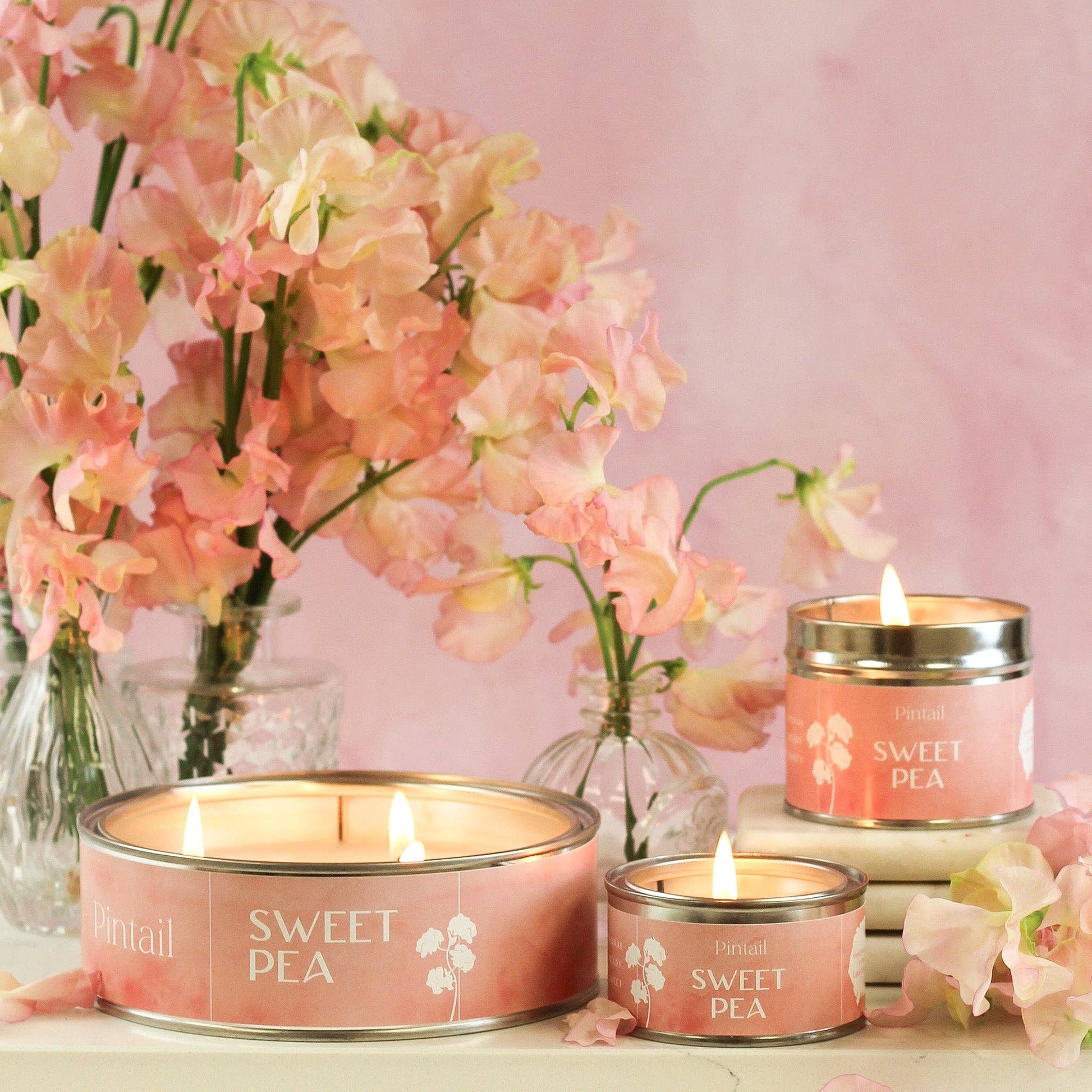 Sweetpea hand poured candle in a small tin with lid.