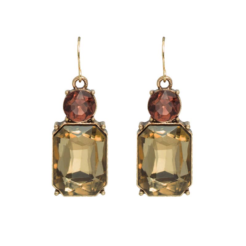 Pair of earrings with brown and yellow gemstones on a white background
