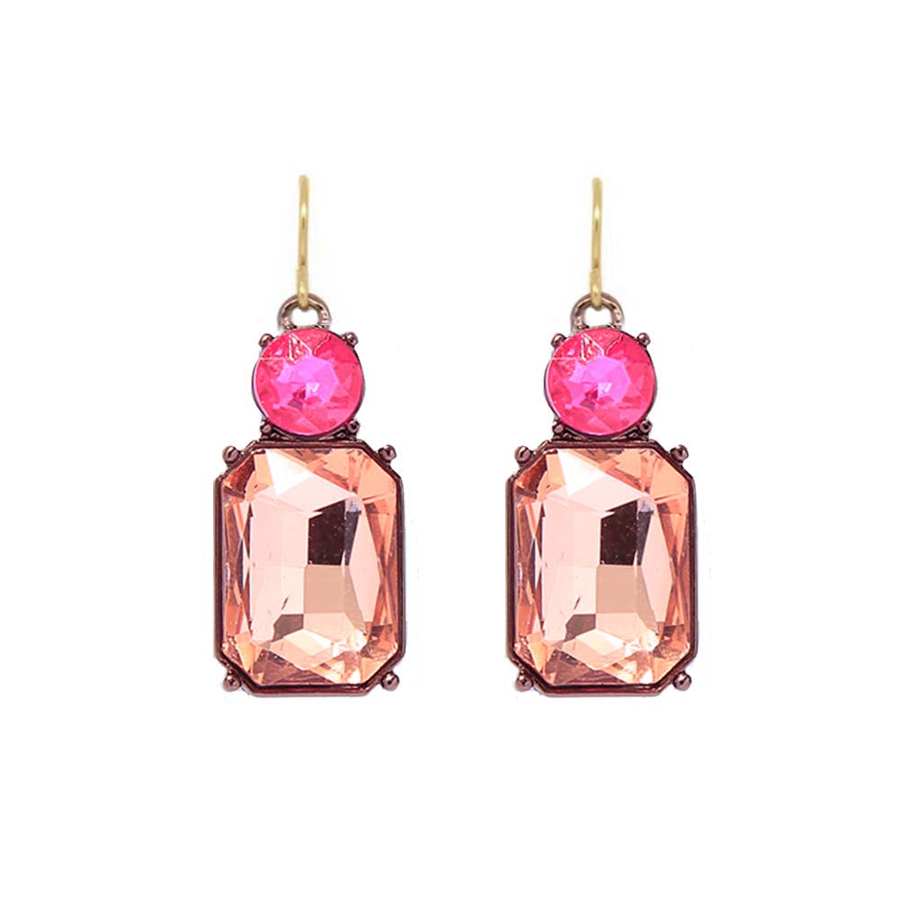 Pair of earrings with pink gemstones and peach-colored rectangular stones on a white background