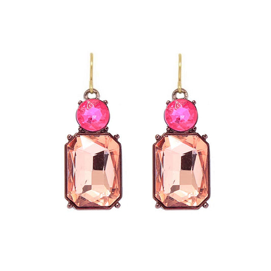 Pair of earrings with pink gemstones and peach-colored rectangular stones on a white background