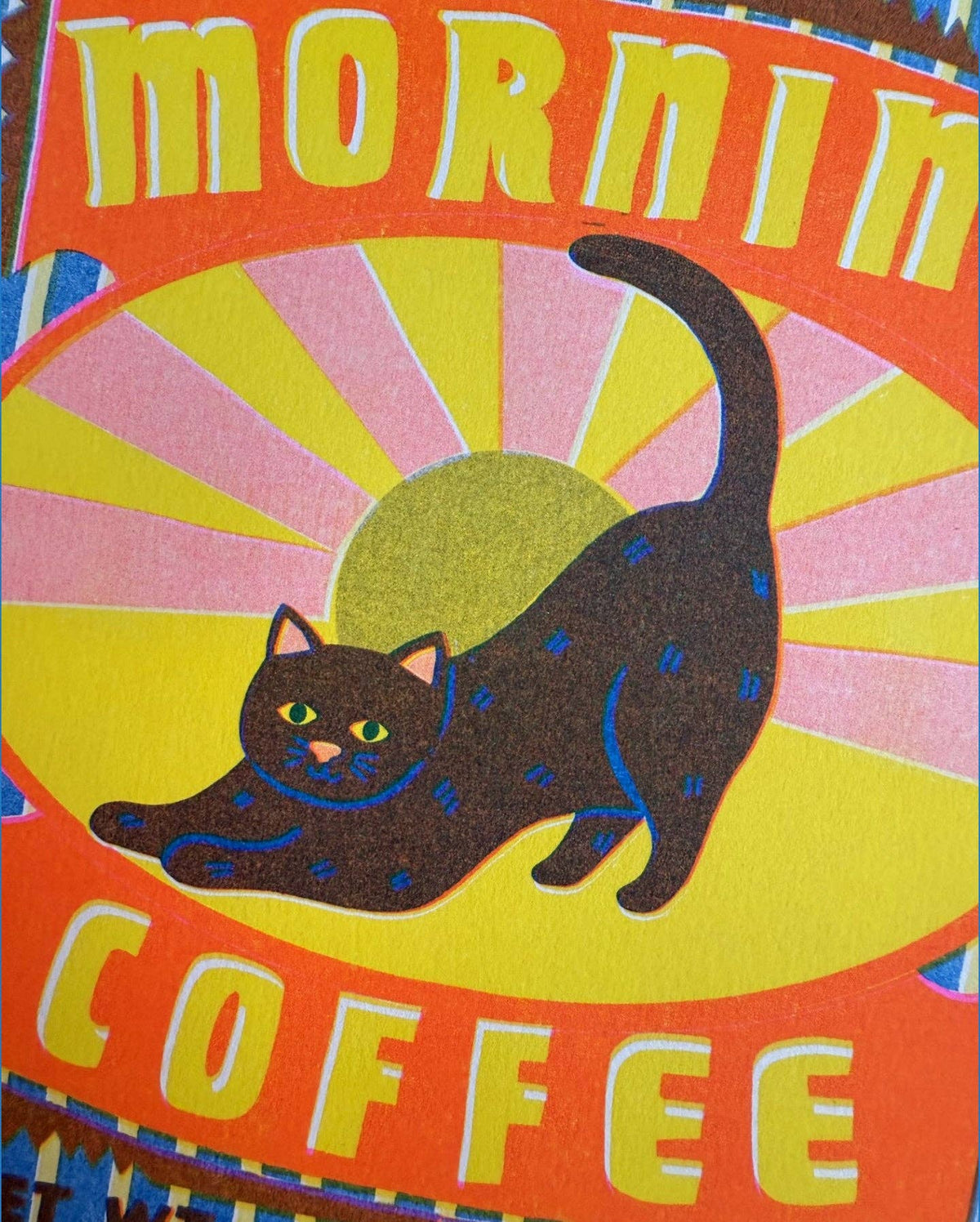 Colorful coffee bag with a cat illustration and 'Mornin Coffee' text.