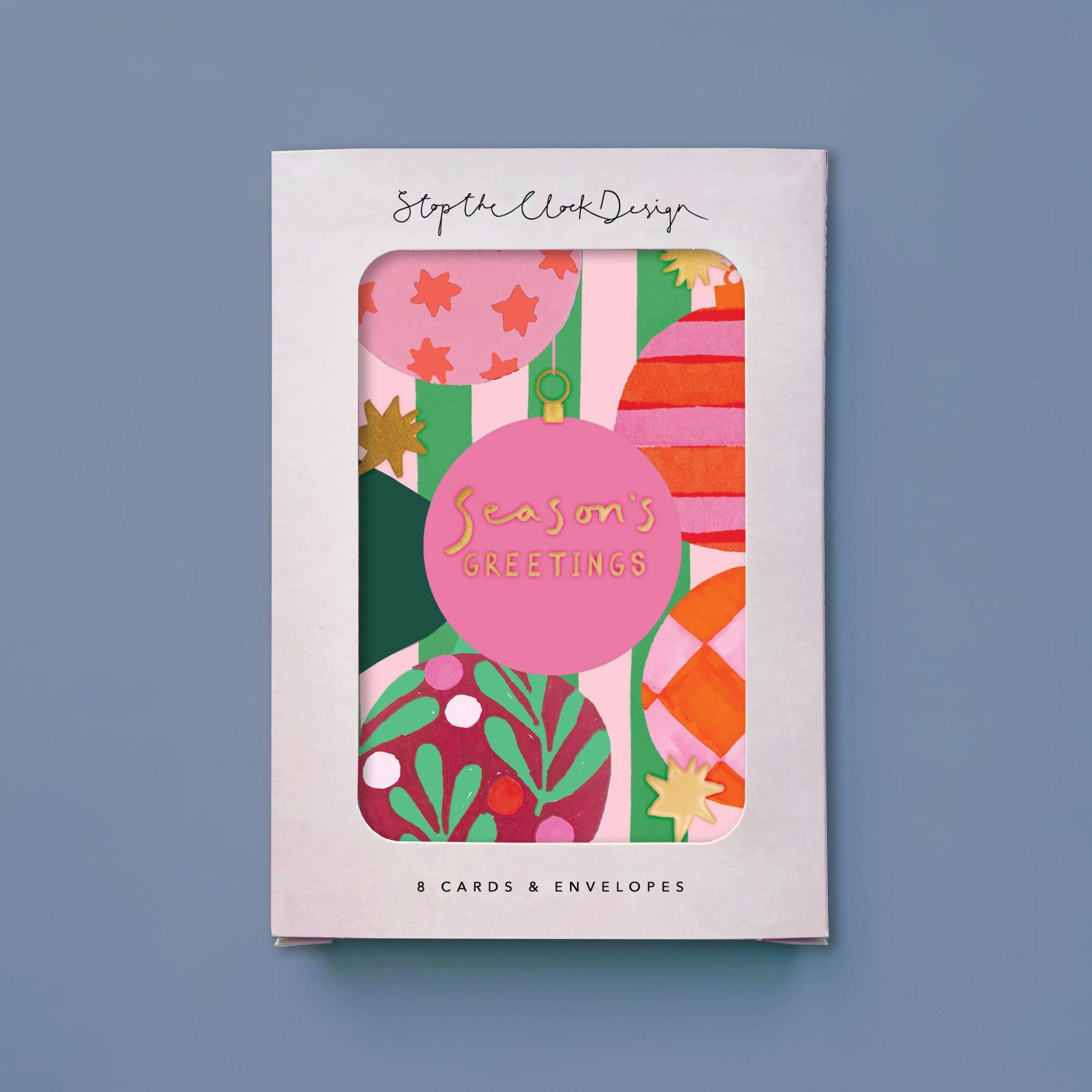 Pack of Christmas cards with colorful design on a blue background