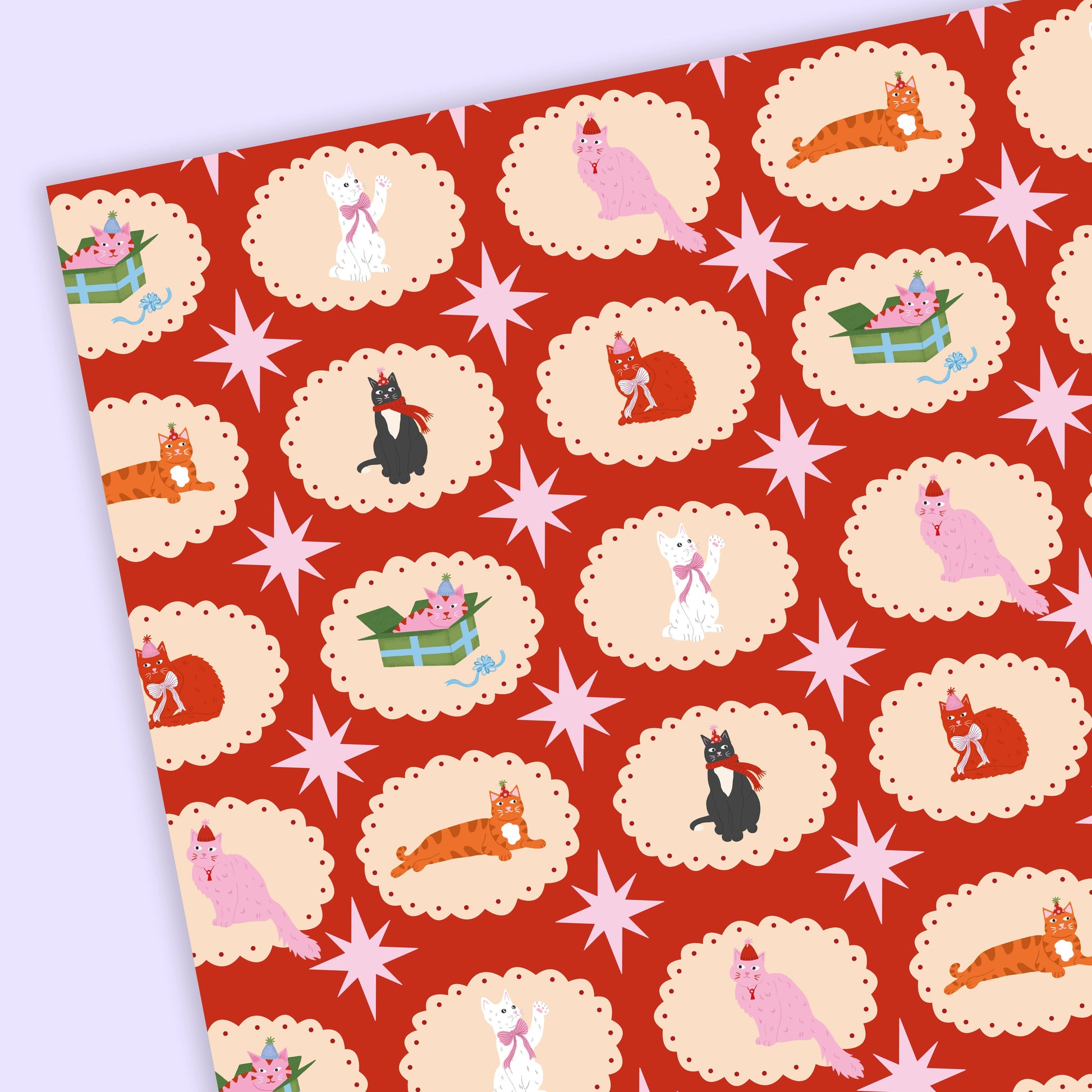 Vintage Style Christmas Wrapping paper with an assortment of cats in Christmas Hearts - Red background.