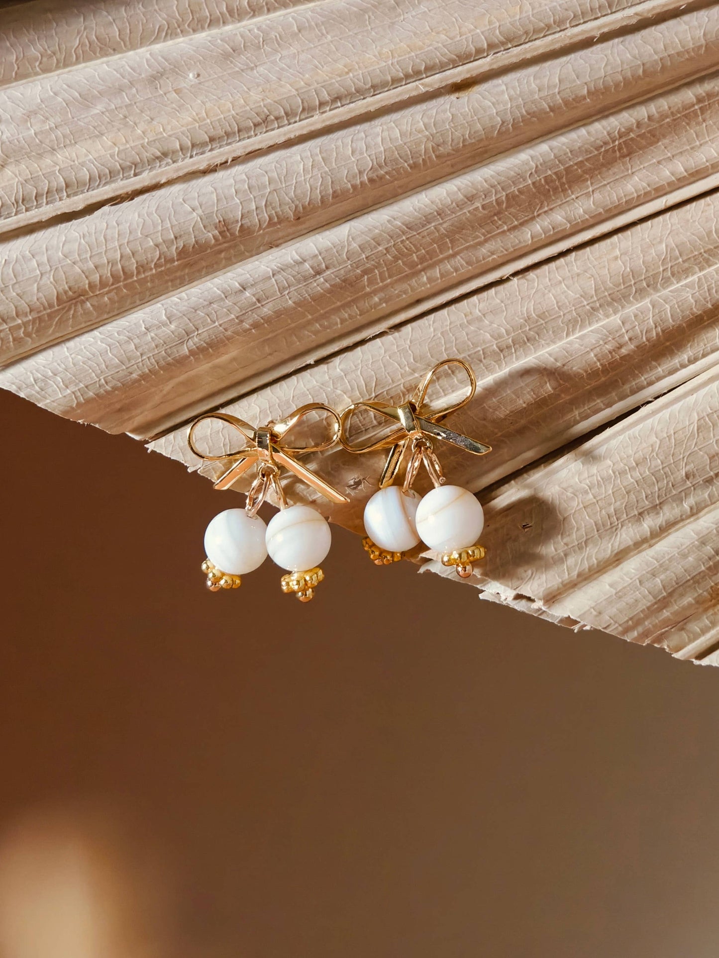 Bow Shell Dangle Earrings