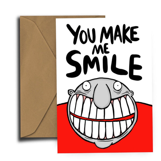 Card with You Make Me Smile Message and a cartoon of a toothy smiling skinhead in a red shirt