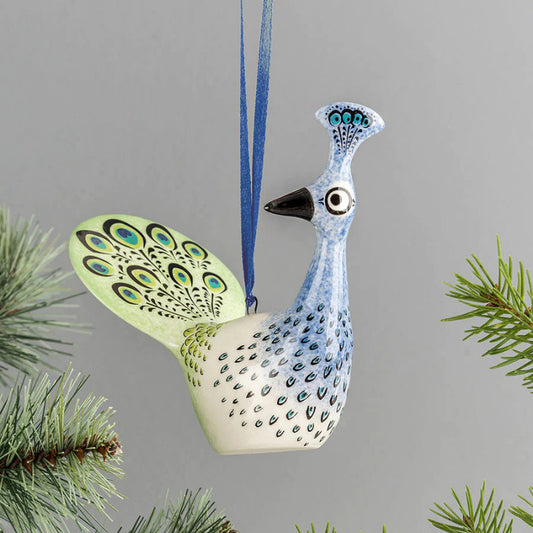 Ceramic peacock hanging in blue and green