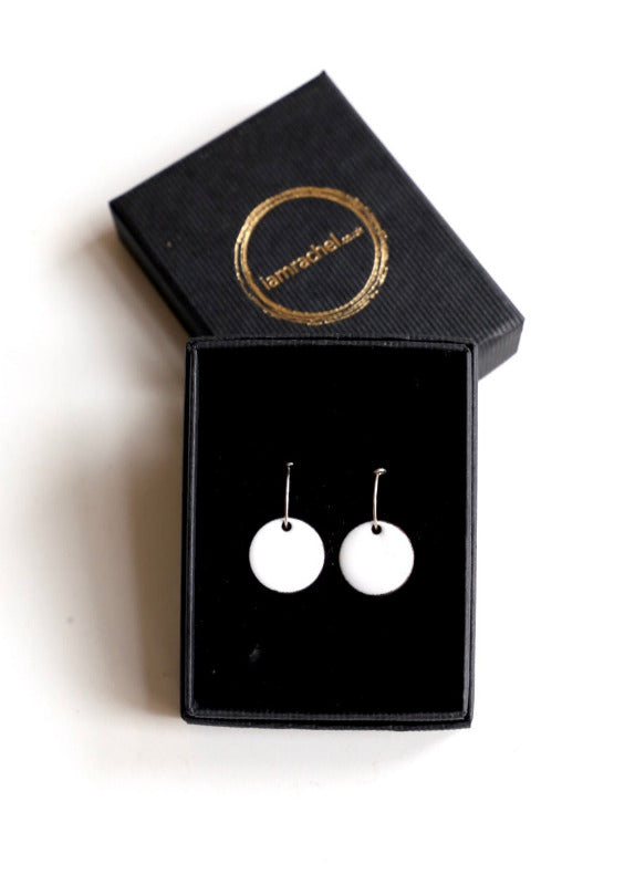 White enamel disc earrings with sterling silver hoops