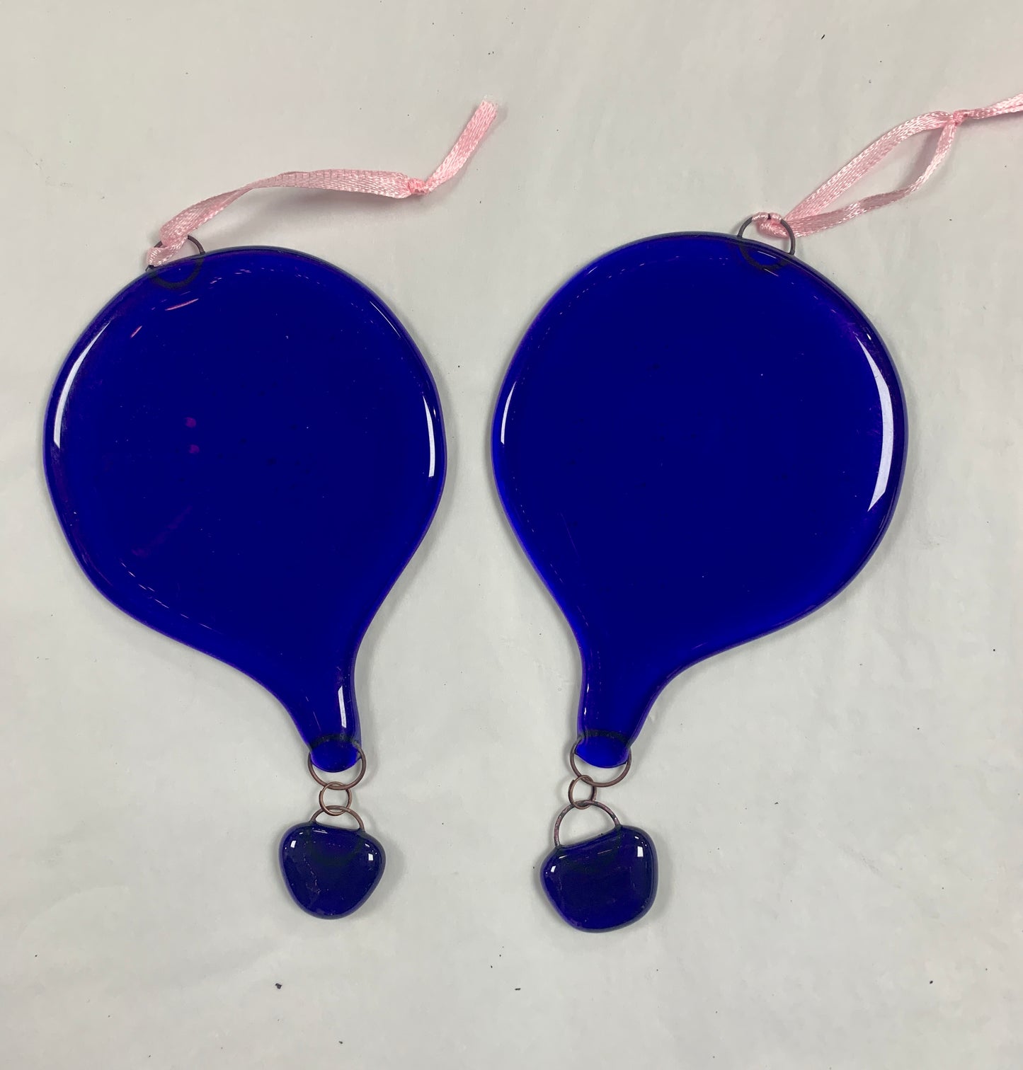 A Bristol Blue solid colour Fused glass Hot air balloon. A decorative glass hanging.