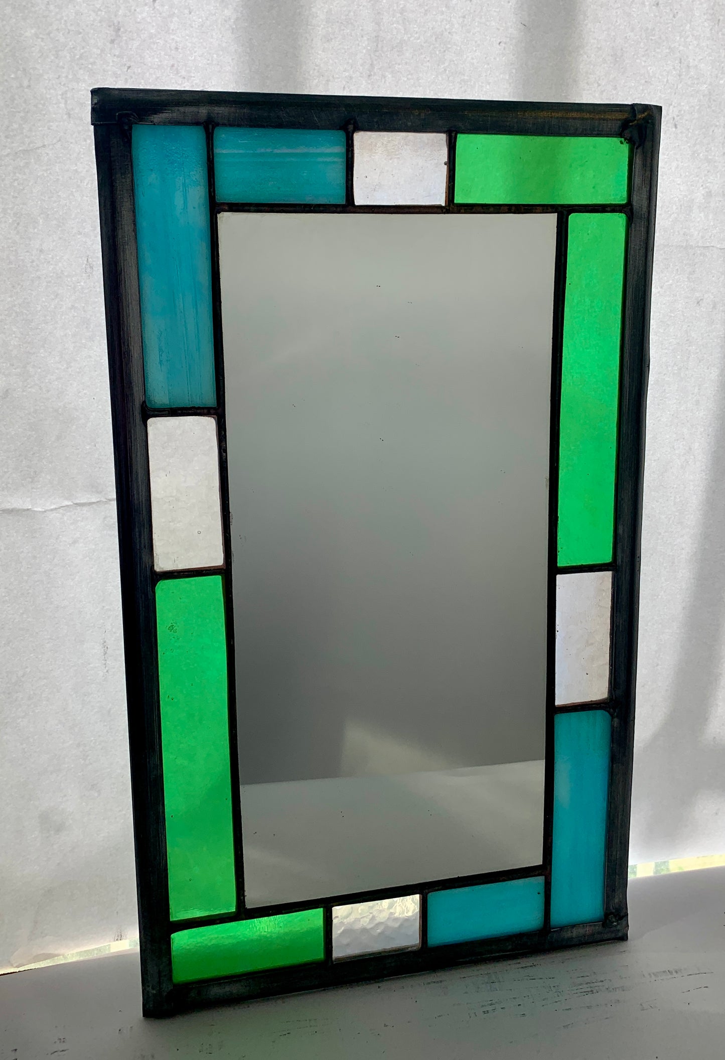 Small Rectangular stained glass mirror. Aqua iridescent glass. Dadswell Glass. Glass Designs Bristol